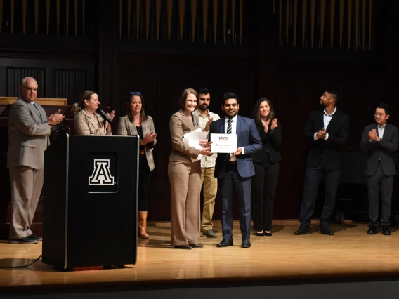 Photo of Dean Kirsten Limesand and Mudith Weerabaddanage at the Grad Slam 2025 Final Round and Award Ceremony. 