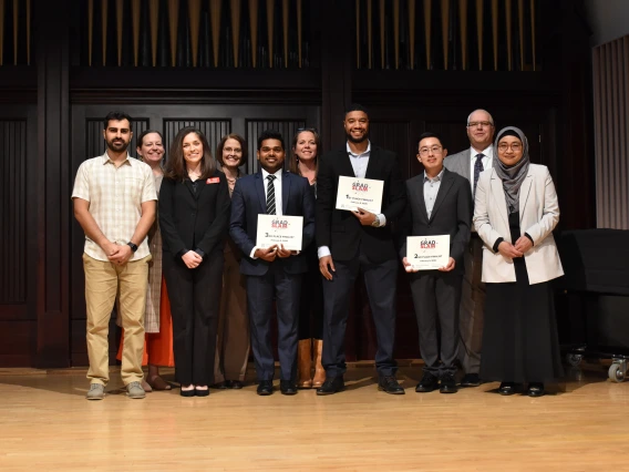 Photo of Grad Slam 2025 Finalists and Judges, and Emcee Dean Limesand. 