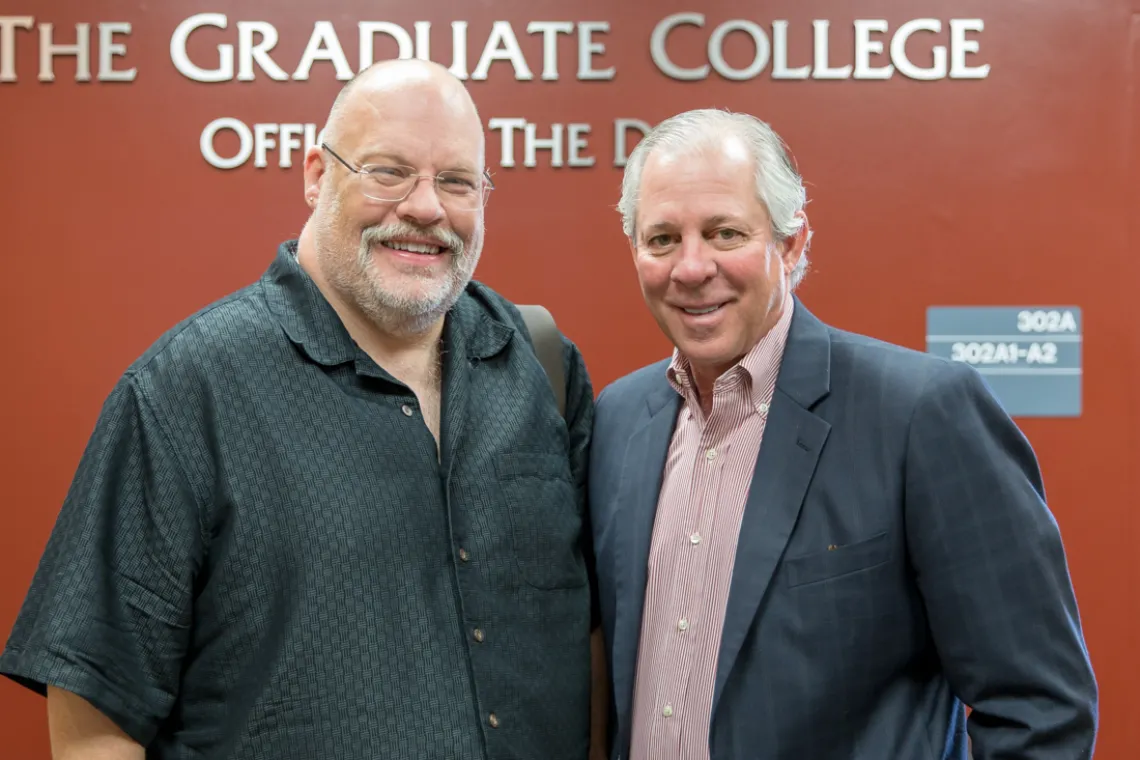 Dean Andrew Carnie (left) and President Robert Robbins (right)