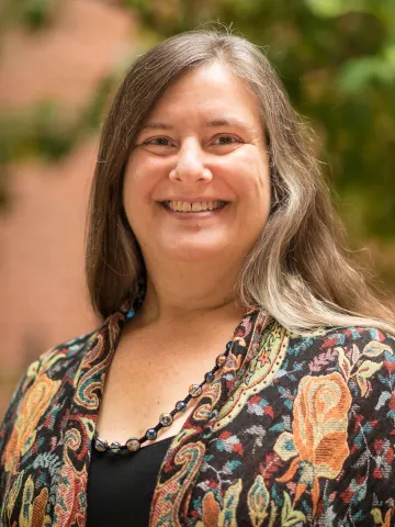 A headshot of Dr. Leslie Dupont.